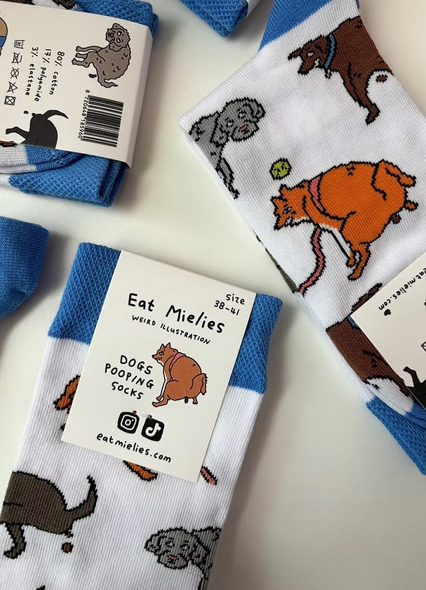 Dogs pooping socks